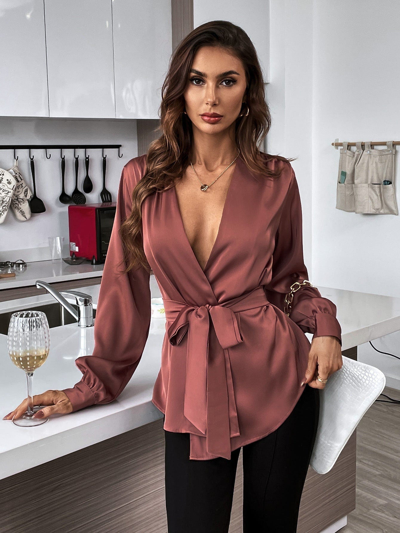 Blouse with belt, asymmetrical hem