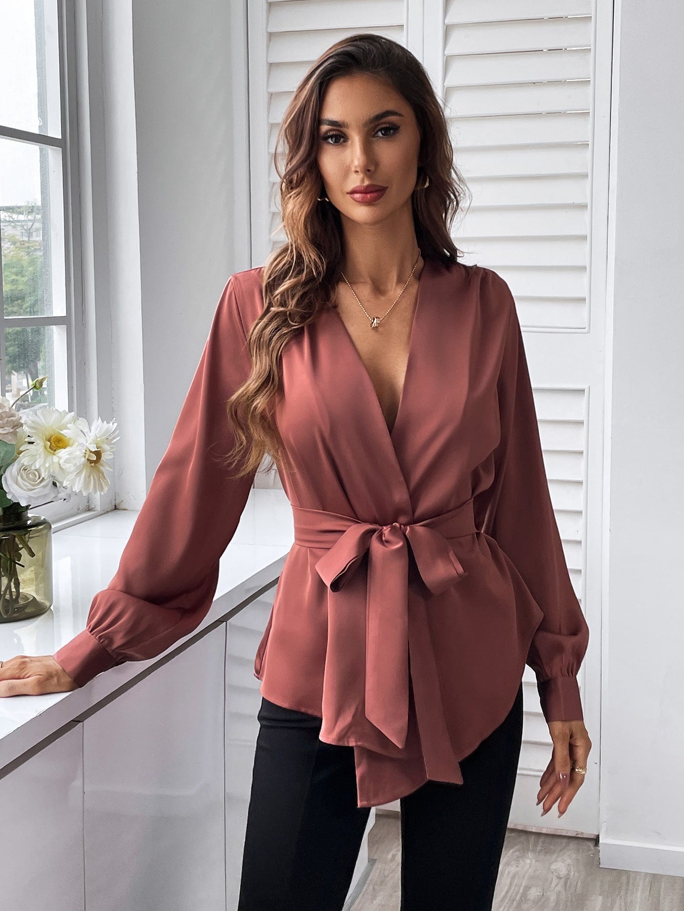 Blouse with belt, asymmetrical hem