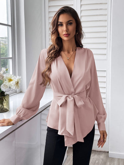 Blouse with belt, asymmetrical hem