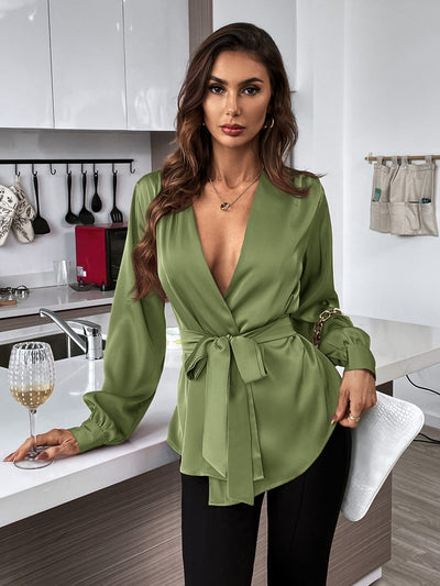 Blouse with belt, asymmetrical hem