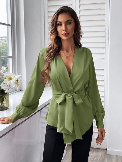 Blouse with belt, asymmetrical hem