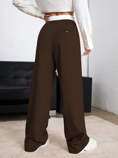 Pants with wide leg cut, pleat detail, color block